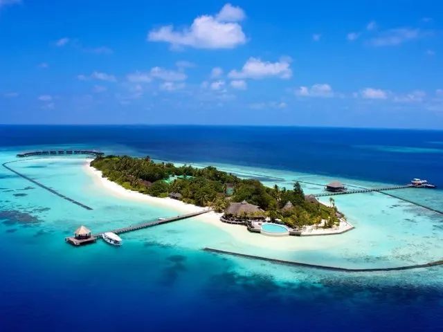 Komandoo Island Resort, Лавиани Атолл