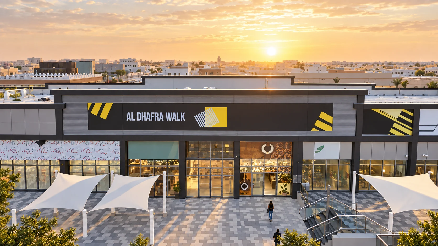 Площадь и фасад Al Dhafra Walk в Мадинат-Зайеде